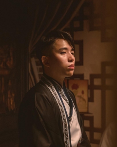 區君義.